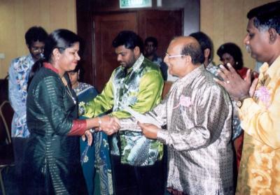 negeswary receiving certificate fr. senator